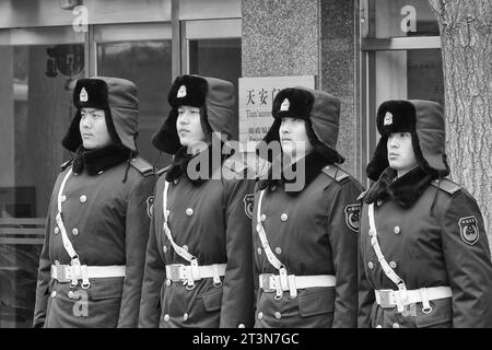 Young Chinese PLA Soldiers Stand To Attention Off Tiananmen Square. Beijing, China. Stock Photo