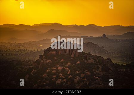 View of Matanga Hill during the sunrise in the morning in the Unesco World Heritage town in Hampi, Karnataka, India Stock Photo