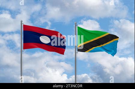 Laos and Tanzania flags waving together on blue cloudy sky, two country ...