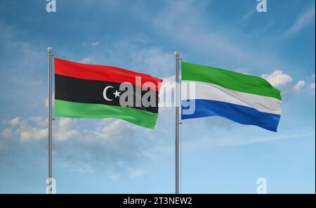 Sierra Leone or Salone and Libya flags waving together in the wind on blue cloudy sky, two country relationship concept Stock Photo