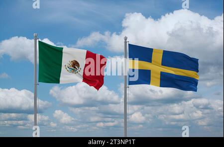 Sweden and Mexico flags waving together in the wind on blue cloudy sky, two country relationship concept Stock Photo