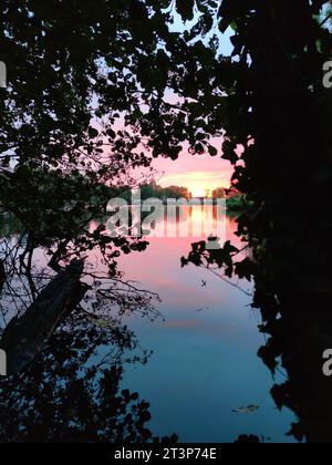 Colorful sunrise over a small lake Stock Photo