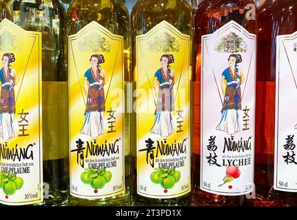 Viersen, Germany - October 9. 2023: Closeup of japanese Nuwang fruit liquor bottles Stock Photo