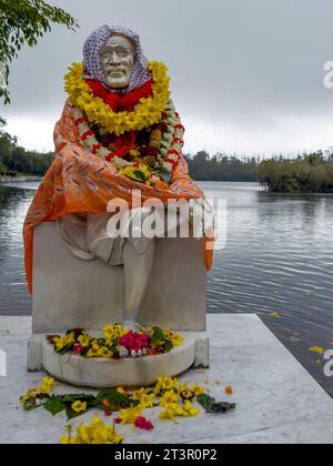 Statue of Indian Spiritual Master Shirdi Sai Baba on Ganga Talao Lake in Grand Bassin, Mauritius Stock Photo