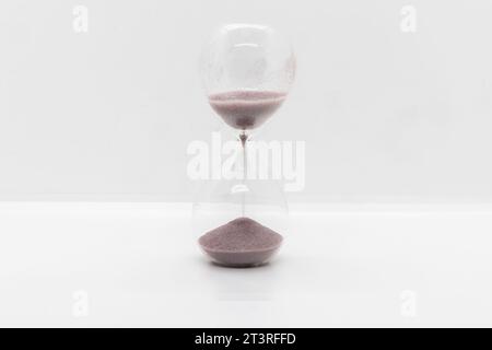 Hourglass isolated on white Stock Photo