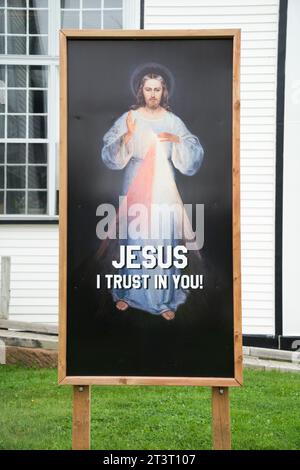 Sign of the Vilnius image of Divine Mercy outside St Augustines Church in Rustico, Prince Edward Island, Canada. Stock Photo