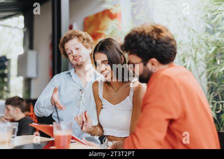Collaborative Strategy and Sustainable Design: Architects and Engineers Discussing Project Planning and Materials Costs Stock Photo