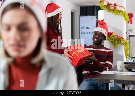 Man formal suit hold gift box. Christmas gift from colleague. Tradition  giving gifts. Businessman excited face hold gift box. Secret santa office  tradition. Celebrate christmas corporate party Stock Photo by ©stetsik  314404120