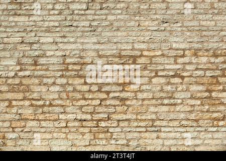 Stone texture in Tallinn. Ancient wall of stones with gray color. Background. Template. For design. Horizontal. Stock Photo