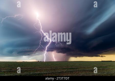 Massive lightning strikes from a supercell thunderstorm near Fleming, Colorado Stock Photo