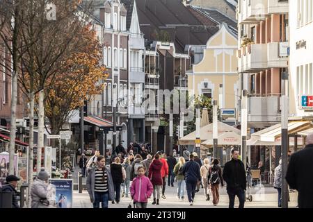 Picture of the main street of Troisdorf, Kolner strasse, with shops and stores while people are passing by. Troisdorf is a city in the Rhein-Sieg-Krei Stock Photo