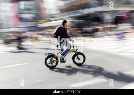 abstract picture with intentional motion blur of crowds of people ...