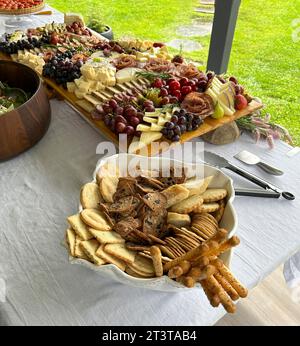 High angle view of grazing board with bowl of biscuits and crackers Stock Photo