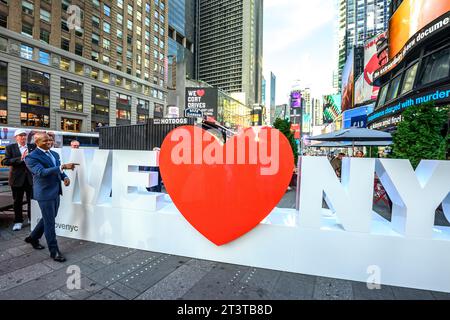 New York, USA. 2nd Oct, 2023. New York City Mayor Eric Adams unveils the Partnership for New York City's “We love NYC” sculpture in Times Square, and kicks off the New York Cares' annual coat drive in Times Square. Credit: Enrique Shore/Alamy Live News Stock Photo