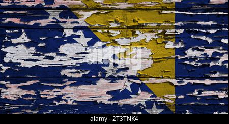 Flag of Bosnia and Herzegovina painted on a grunge wooden board. Stock Photo