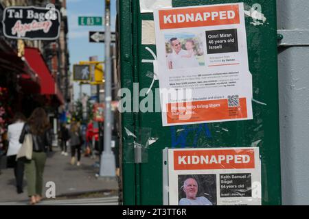New York City, 25 October 2023: Posters in New York showing Israelis held hostage by Hamas. These posters call attention to the plight of Israeli citizens and Jewish people of other nationalities kidnapped on 7 October and currently being held in Gaza. Anna Watson/Alamy Live News Stock Photo