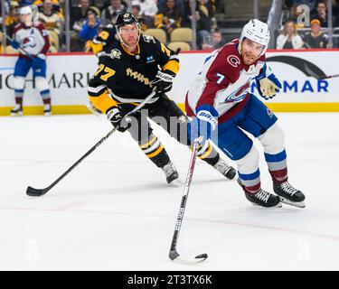 Colorado Avalanche defenseman Devon Toews (7) hugs teammate goaltender ...