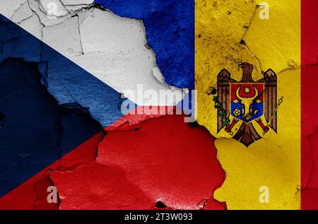 flags of Czechia and Moldova painted on cracked wall Stock Photo