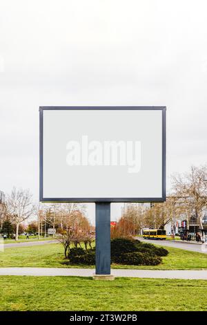 Blank vertical street billboard poster green grass city road Stock Photo