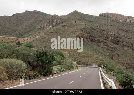 Road going up mountains Stock Photo