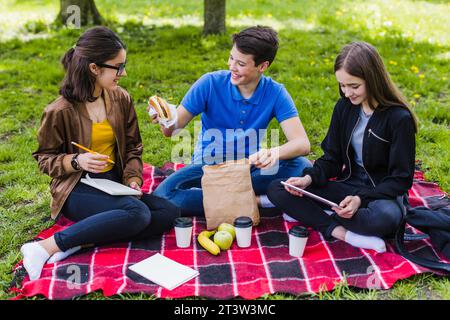 Students having fun lunch time Stock Photo