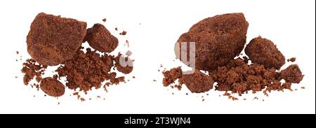 Dark muscovado sugar or Barbados sugar isolated on white background. Top view. Flat lay Stock Photo