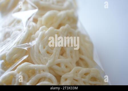 White indonesian cracker that is so delicious, kerupuk udang putih (close up) Stock Photo