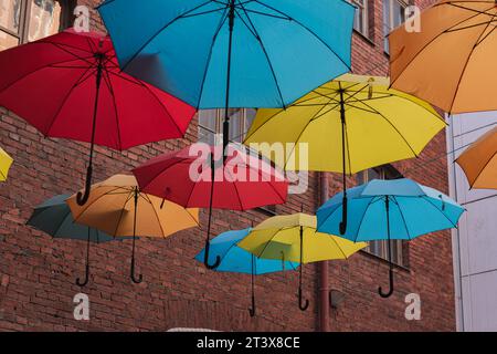 Colorful umbrellas on the streets of the old city Stock Photo