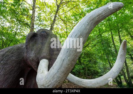 figure of a life-size mammoth, Paleolithic Park of the Cueva del Valle, Rasines, Cantabria, Spain. Stock Photo