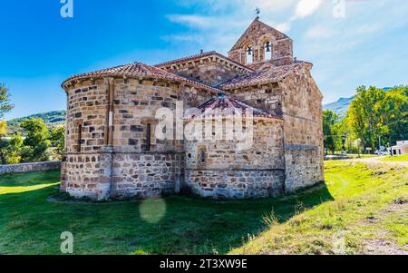 View of the apses. The old collegiate church of San Salvador, current parish church, located in the town of San Salvador de Cantamuda. One of the most Stock Photo