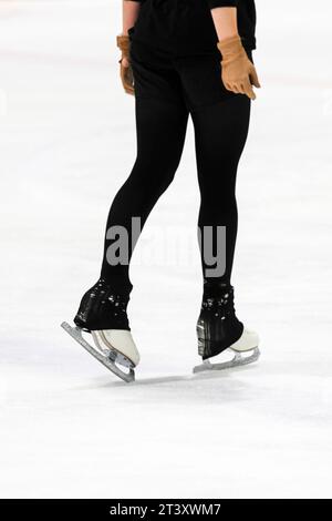 ice skates on white ice  sport woman Stock Photo