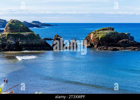 Remains of the old iron loading dock. Porcía beach is located in the Asturian council of El Franco and is shared with Tapia de Casariego. Principality Stock Photo