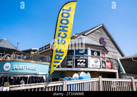 A banner advertising a surf school at Fistral in Newquay in Cornwall in the UK. Stock Photo