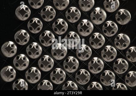 Abstract macro photography of grater blades for food grating. Close-up detail. Visible scratch from using this tool. Stock Photo