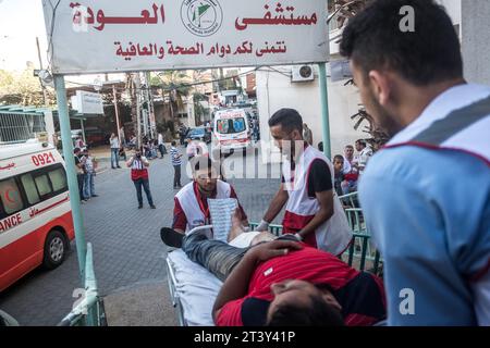 Gaza, Palestine. 14th May, 2018. Michael Bunel/Le Pictorium - Gaza - Israel conflict - 14/05/2018 - Palestine/Gaza/Gaza - A wounded Palestinian protester is sent to Al Awda hospital, after being injured following an intervention by Israeli security forces during a demonstration to mark the 70th anniversary of the Nakba, also known as the Day of the Catastrophe move the American embassy from Tel Aviv to Jerusalem. May 14, 2018. Gaza City. Palestine. Credit: LE PICTORIUM/Alamy Live News Stock Photo