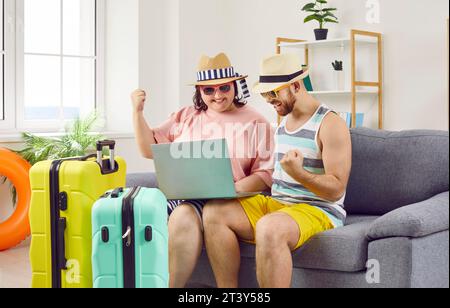 Funny tourists couple bought flying tickets at bargain price Stock Photo
