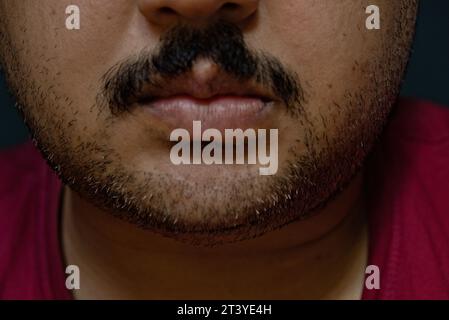partially blurred front face view of an asian indian adult male Stock Photo