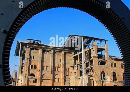 TANGSHAN - NOVEMBER 4: The gears and abandoned factories in the Qixin cement plant on november 4, 2013, tangshan city, hebei province, China. Stock Photo