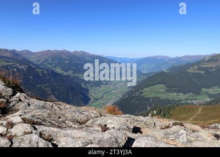 Wide view from the Ahorn plateau into the Zillertal under a clear blue sky Stock Photo
