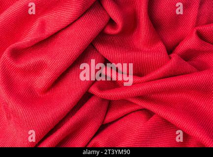 wrinkled pink fabric texture background closeup Stock Photo