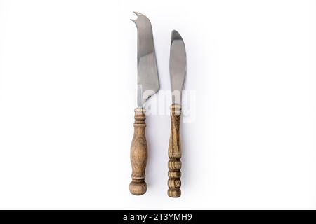 two knives with wooden handles on a white fong close-up Stock Photo