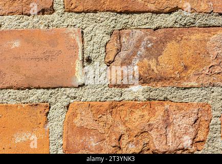 red brick wall texture background closeup Stock Photo