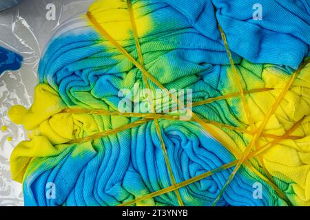 wrinkled fabric yellow and blue texture close-up Stock Photo