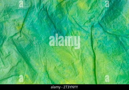 green crumpled paper texture background close-up Stock Photo