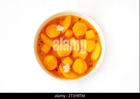 Salmon ceviche in jelly with orange and mango-passion fruit sauce isolated Stock Photo
