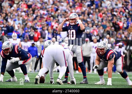 Oct 22, 2023; New England Patriots quarterback Mac Jones (10) signals to teammates during the second half against the Buffalo Bills in Foxborough, Massachusetts. Eric Canha/Cal Sport Media Stock Photo