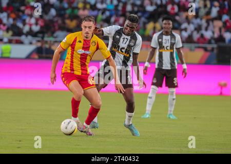 DAR ES SALAAM, TUNISIA – OCTOBER 22:    MOOTEZ ZADDEM of Esperance and  NGALAMULUME BATO of Mazembe during the African Football League match between T Stock Photo