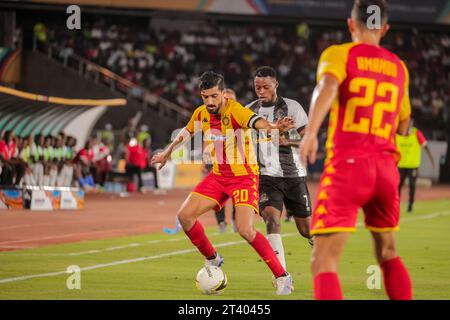 DAR ES SALAAM, TUNISIA – OCTOBER 22:    MOHAMED AMINE BEN HMIDA of Esperance and  PHILLIPPES BENI KINZUMBI of Mazembe during the African Football Leag Stock Photo