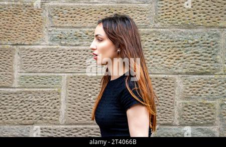 During a photo-shoot in Dundee city centre a stunning Spanish woman Beatriz Villacorta is having fun posing for the camera in Dundee, Scotland Stock Photo