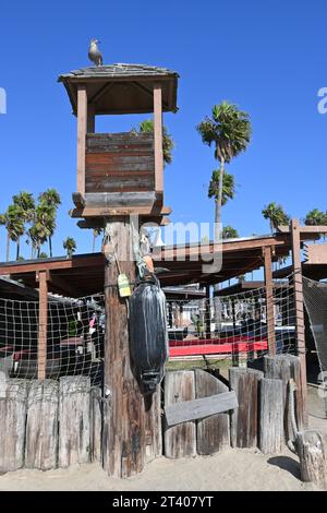 NEWPORT BEACH, CALIFORNIA - 26 OCT 2023: The Dory Fishing Fleet and Market is a beachside fishing cooperative at the pier founded in 1891. Stock Photo